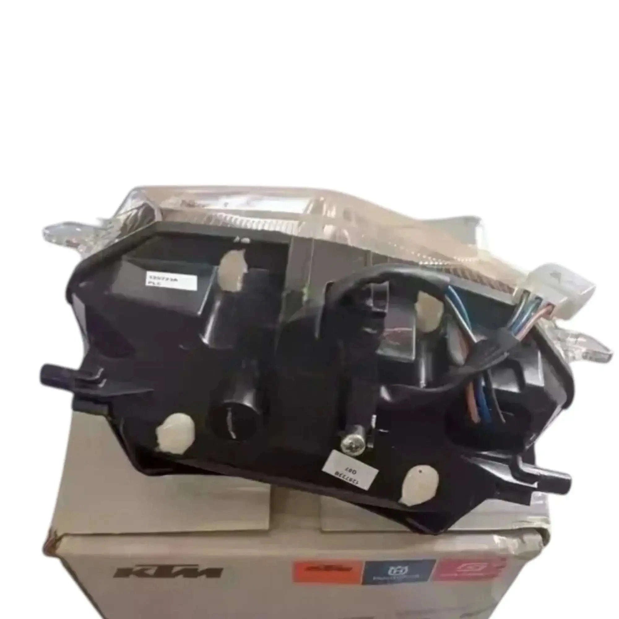 Durable plastic tail light assembly for rear vehicle use, designed for easy installation and optimal visibility
