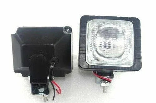 Pair of black work lights with clear square lens and mounting base