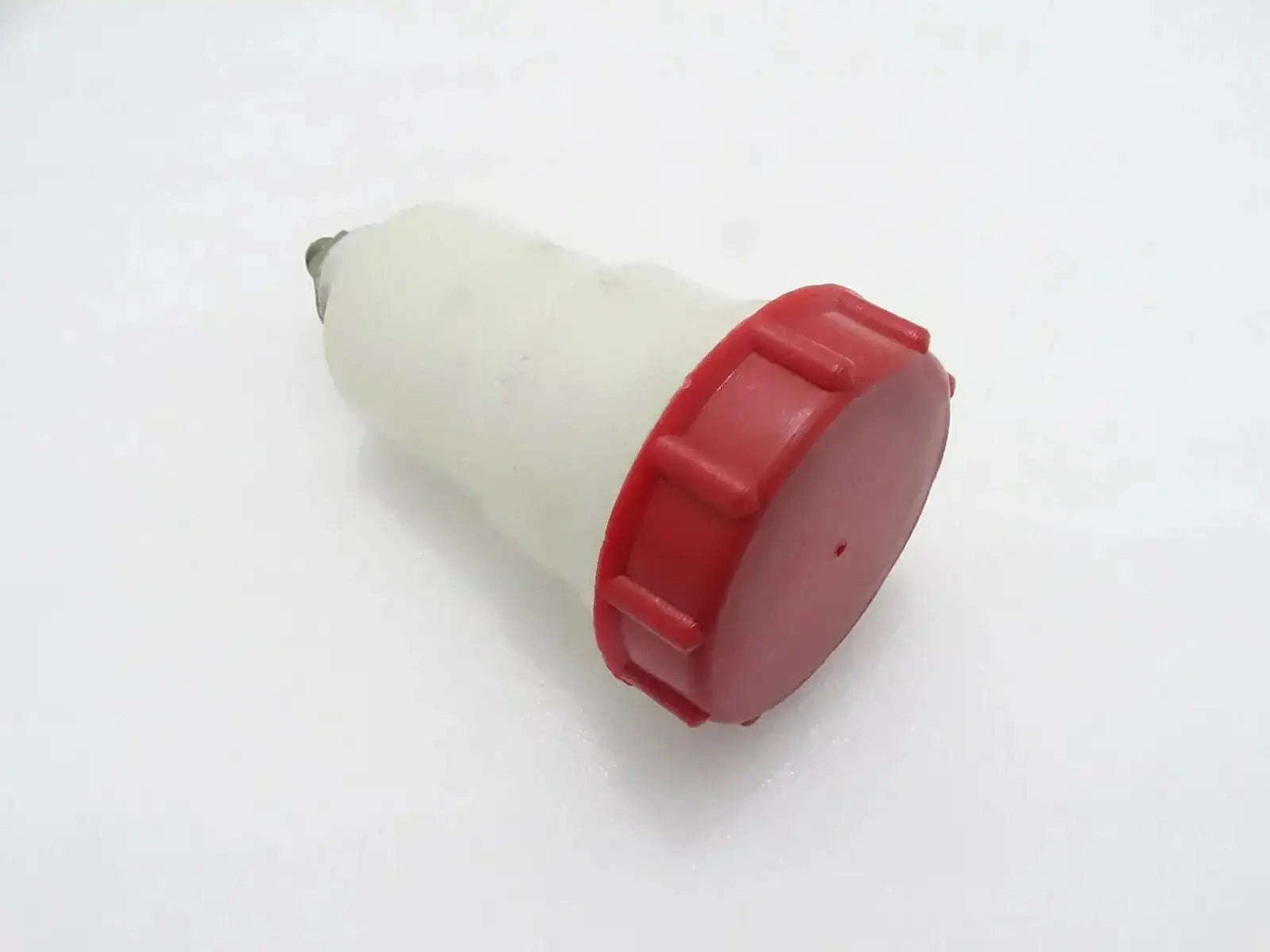 Plastic reservoir fit for JCB 3CX with a red cap for easy access and fluid storage