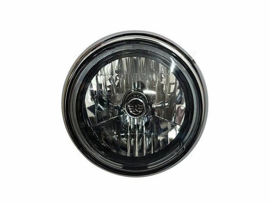 Royal Enfield Meteor headlight assembly with a round design and halogen bulb