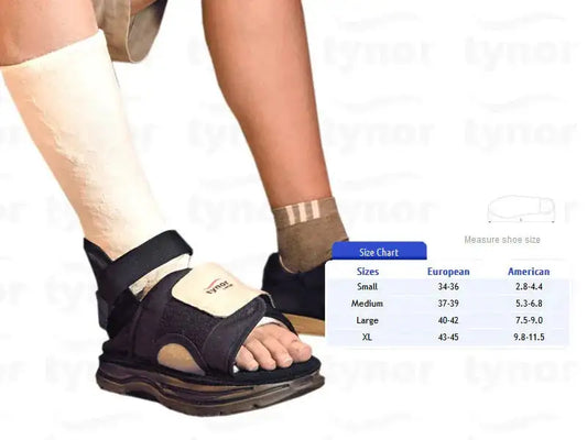 Black orthopedic cast shoe with adjustable strap and open toe, medium fit