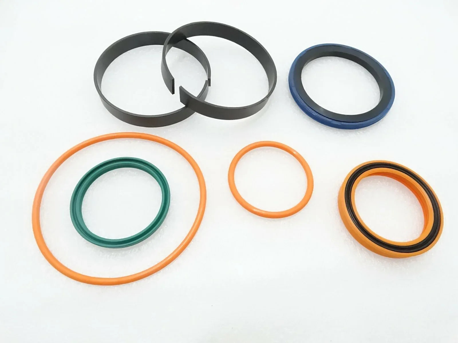 Rubber seal kit with black, blue, green, orange and tan O-rings