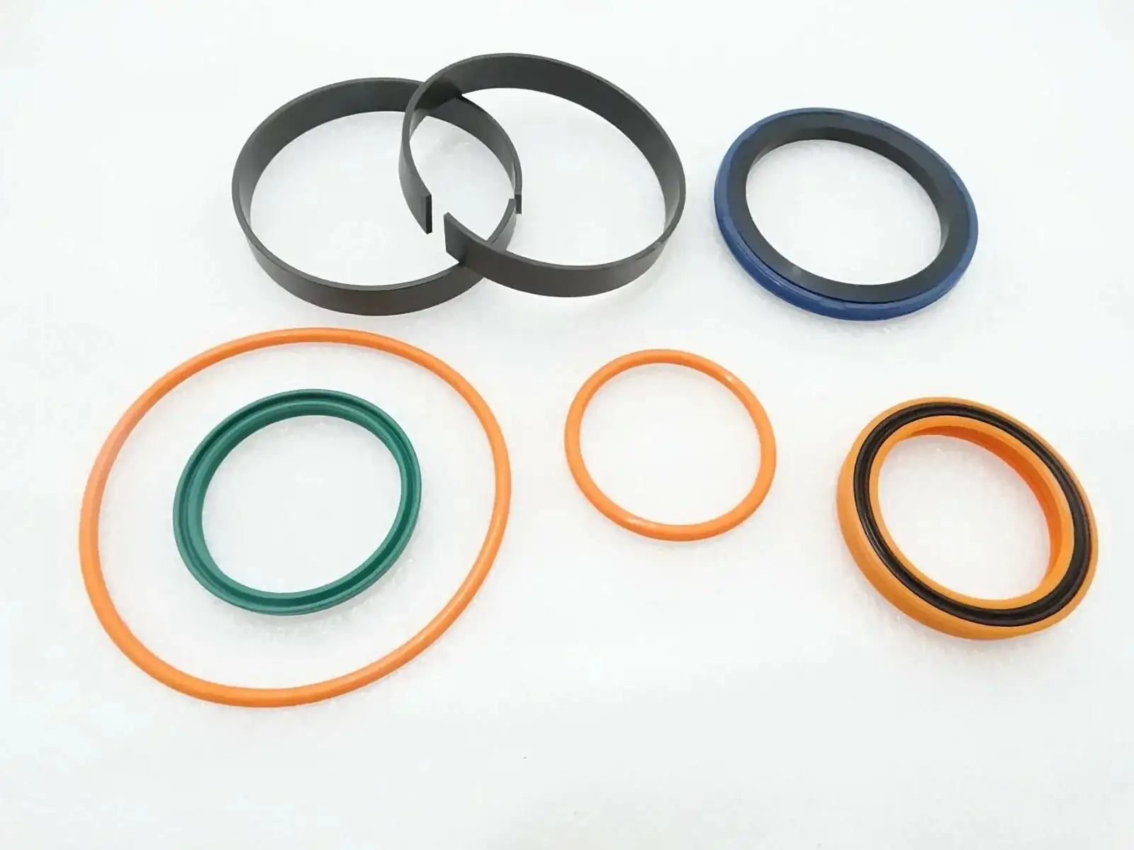 Rubber seal kit with black, blue, green, orange and tan O-rings