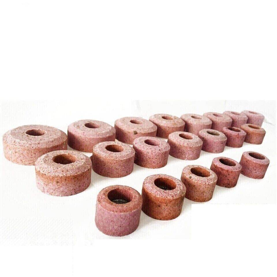 Variety of Sioux valve seat grinding stones in different sizes for precise valve seat restoration