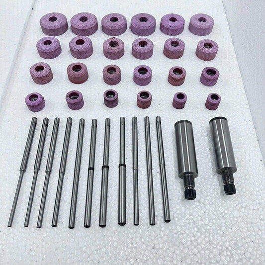Sioux valve seat grinding wheels set with multiple sizes in pink abrasive material for valve seat resurfacing