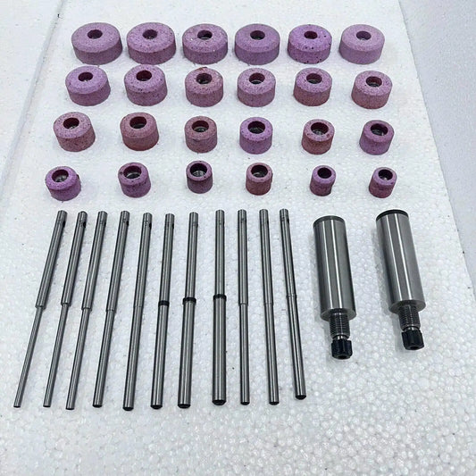 Sioux valve seat grinding wheels set with multiple sizes in pink abrasive material for valve seat resurfacing
