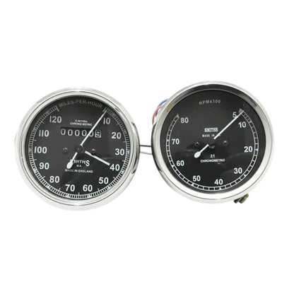 Speedometer gauge pair, black dial faces, mph and tach scales with needles