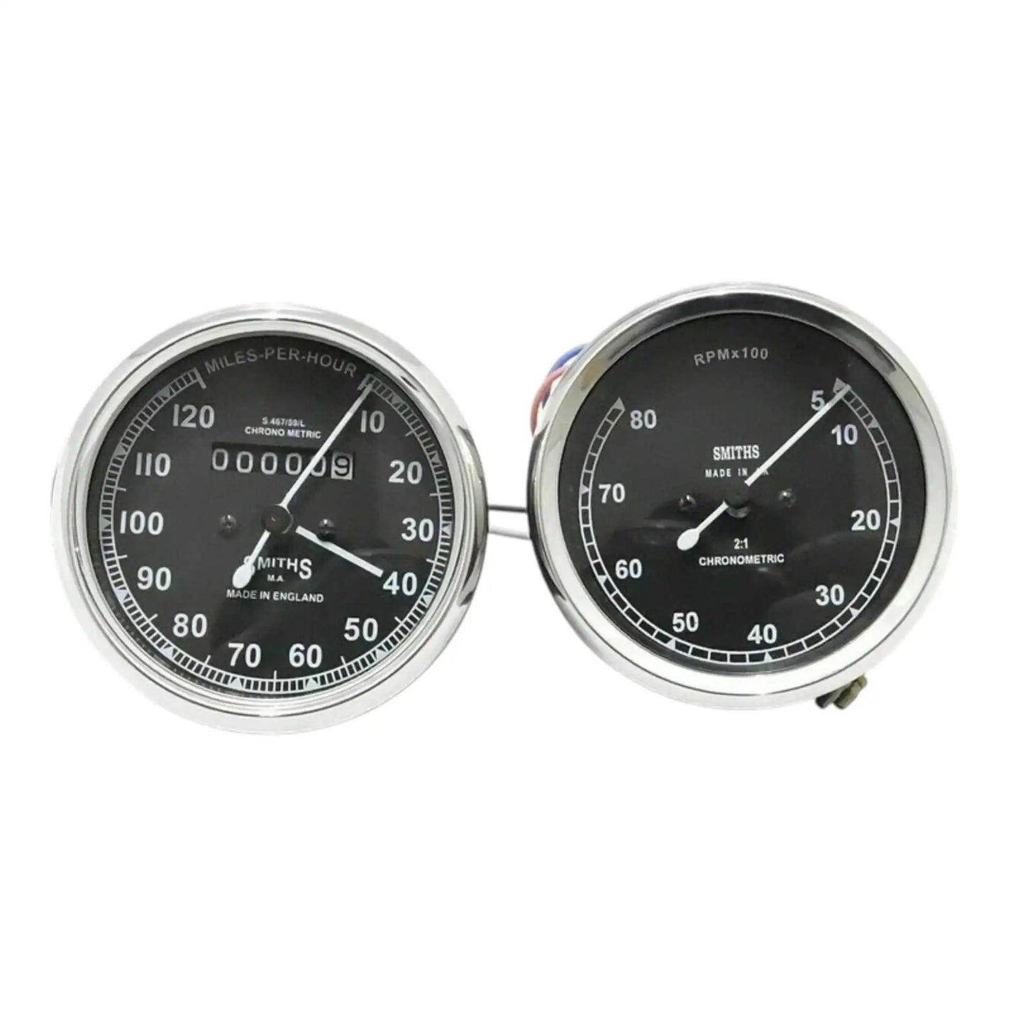 Speedometer gauge pair, black dial faces, mph and tach scales with needles