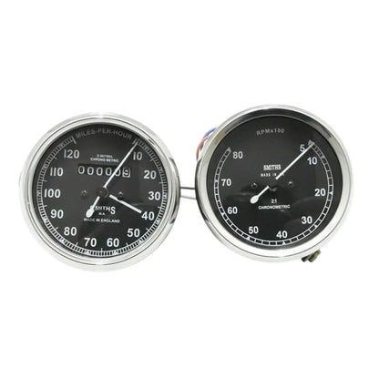Speedometer gauge pair, black dial faces, mph and tach scales with needles