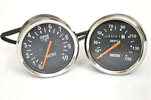 Smith tachometer and speedometer pair, black dials, chrome bezels
