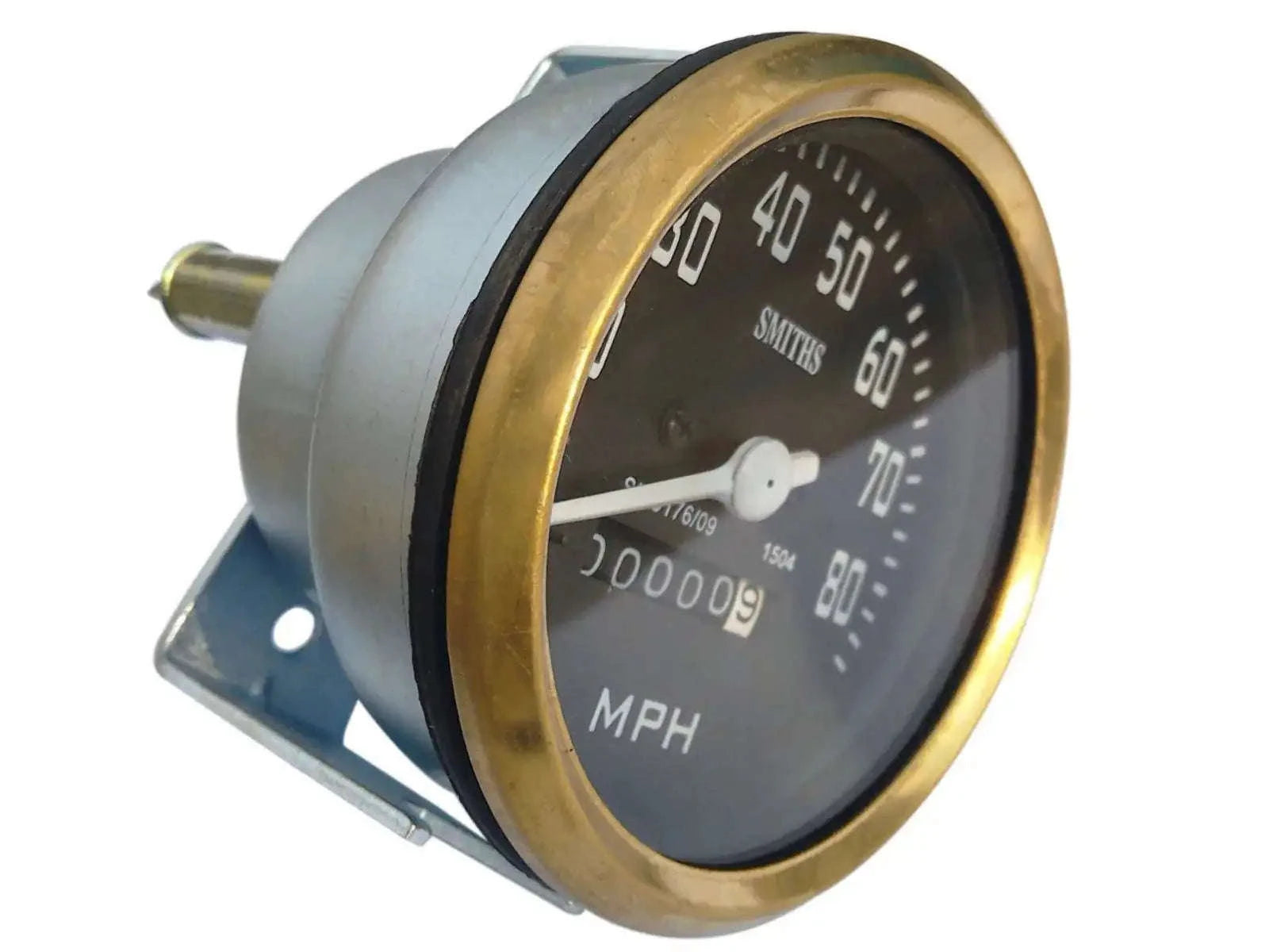Round MPH speedometer with black face and brass bezel, Smiths logo and mounting bracket