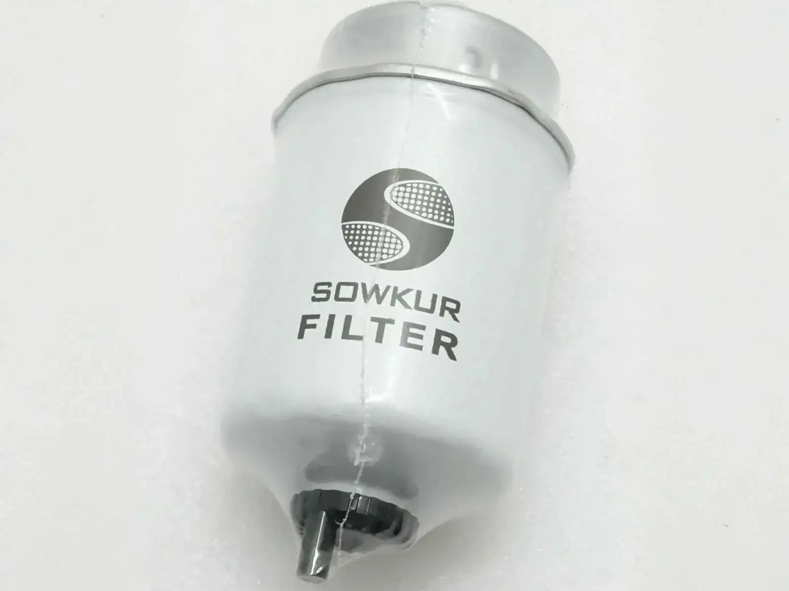 Fuel sediment filter canister with metal cap and outlet spout, transparent body