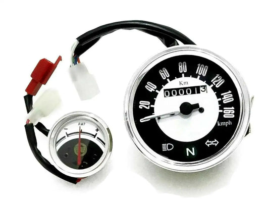 Kmph speedometer and ammeter gauges with black dials and chrome bezels