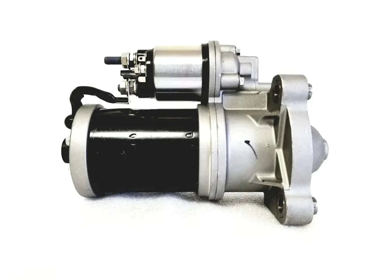 Starter motor assembly with solenoid and mounting flange, metallic and black