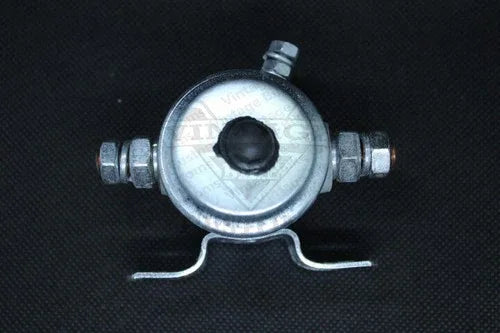 12V starter solenoid with round silver housing, black cap, and two side terminals