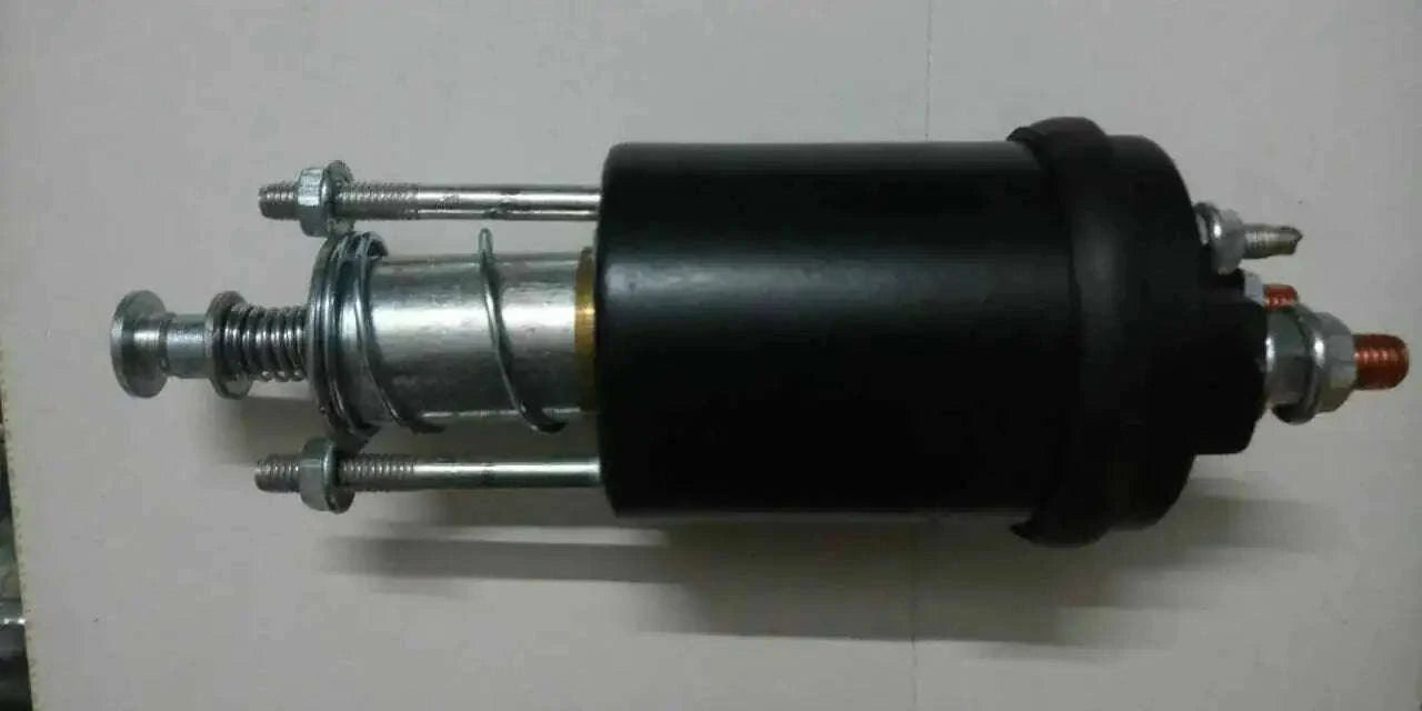 Starter solenoid with black cylindrical housing and metal mounting rods