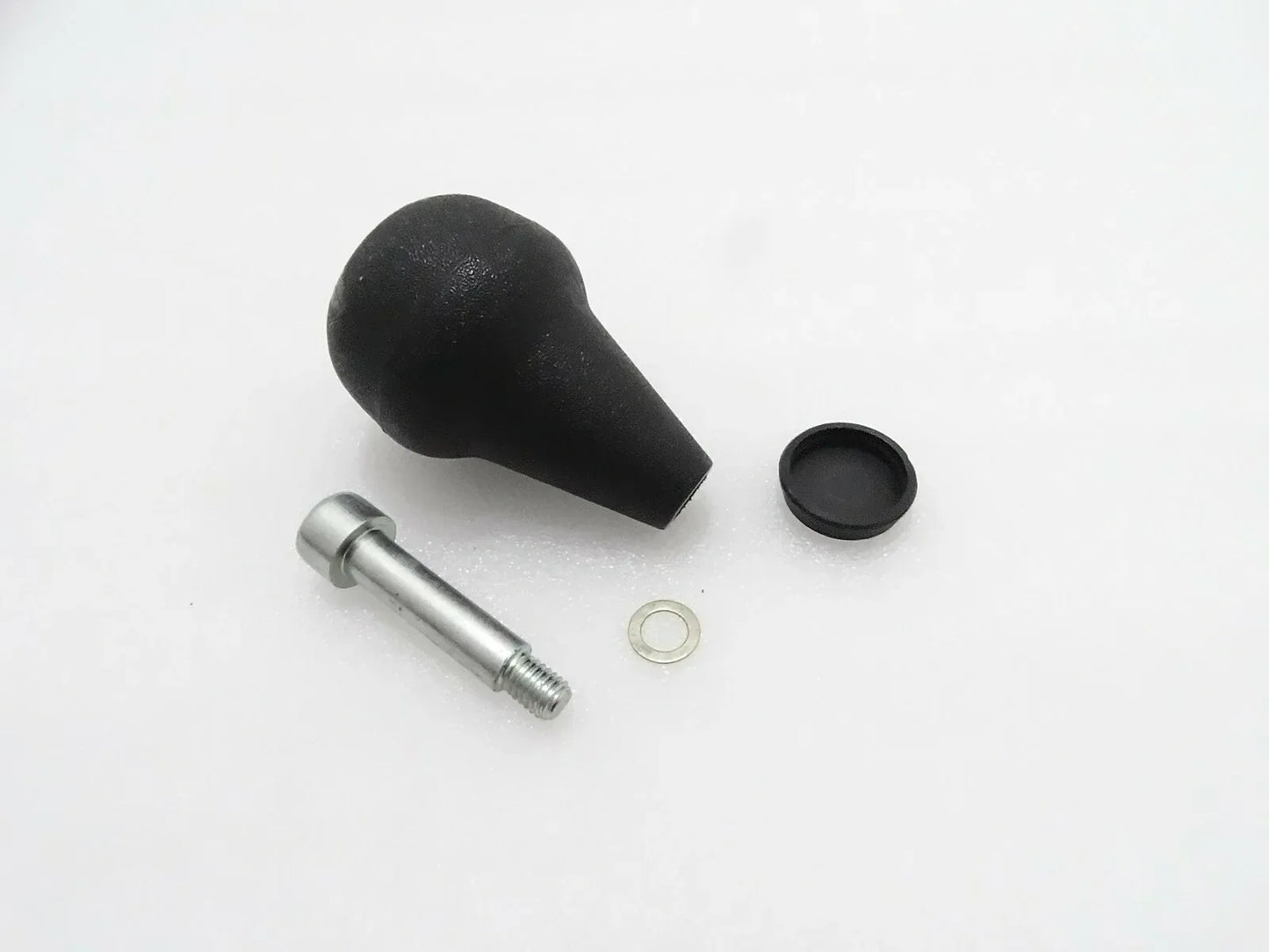 Steering knob kit with black rubber grip, metal shaft, and retaining ring