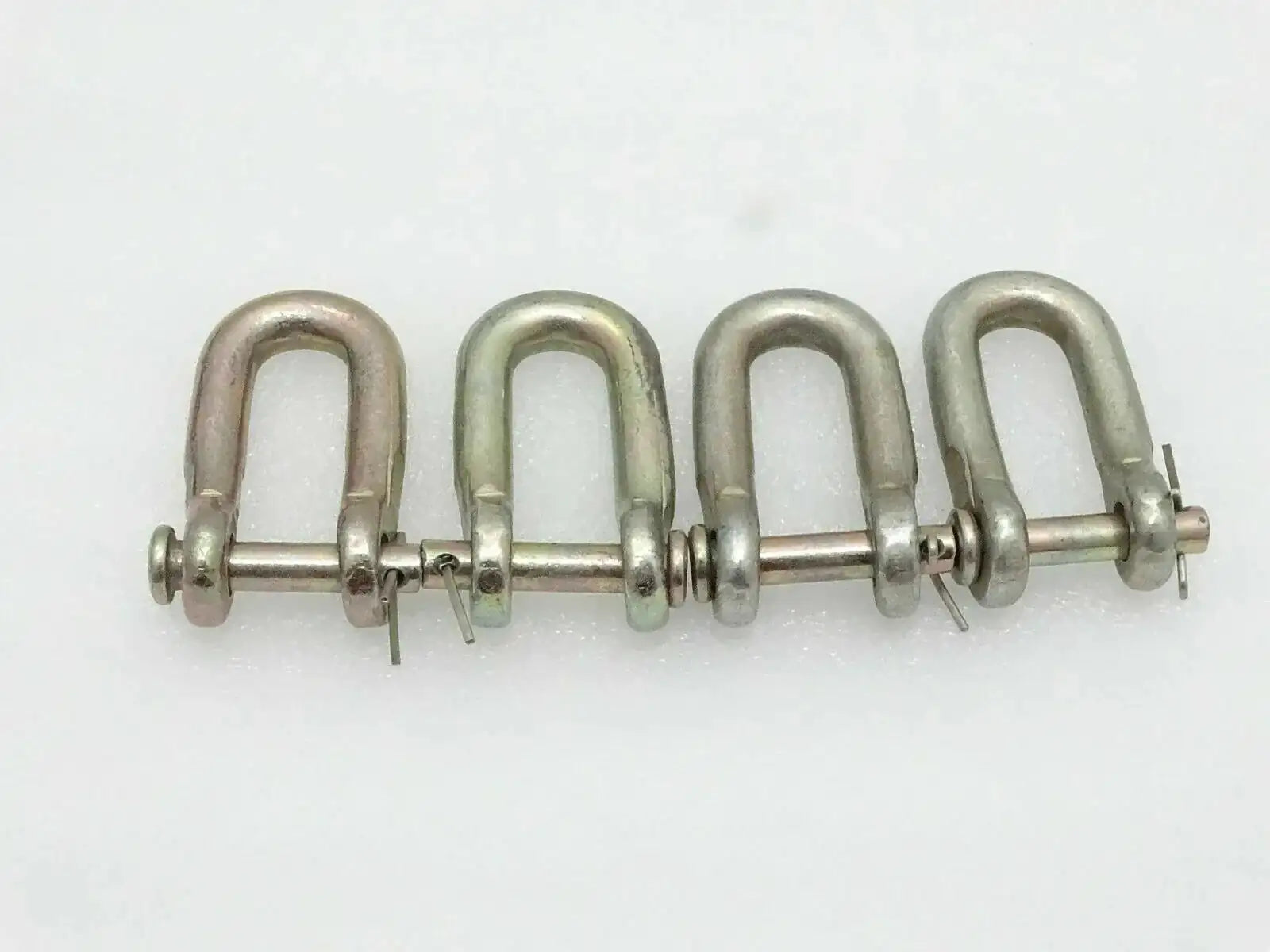 Metal D-shackle check chain assembly with four inner shackles and pins