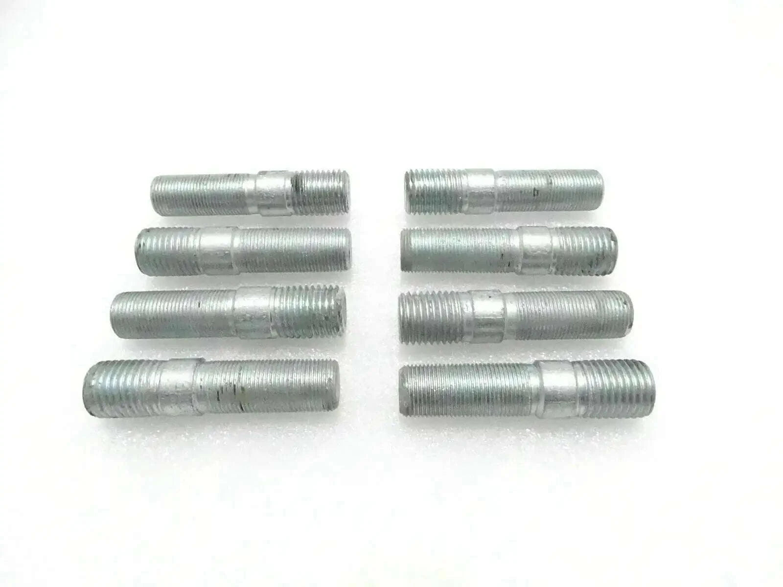 Set of JCB backhoe loader exhaust manifold studs, steel, threaded design for durable engine installation