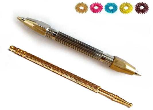 Sujok acupressure probe with metal tips and colorful diagnostic rings for effective therapy