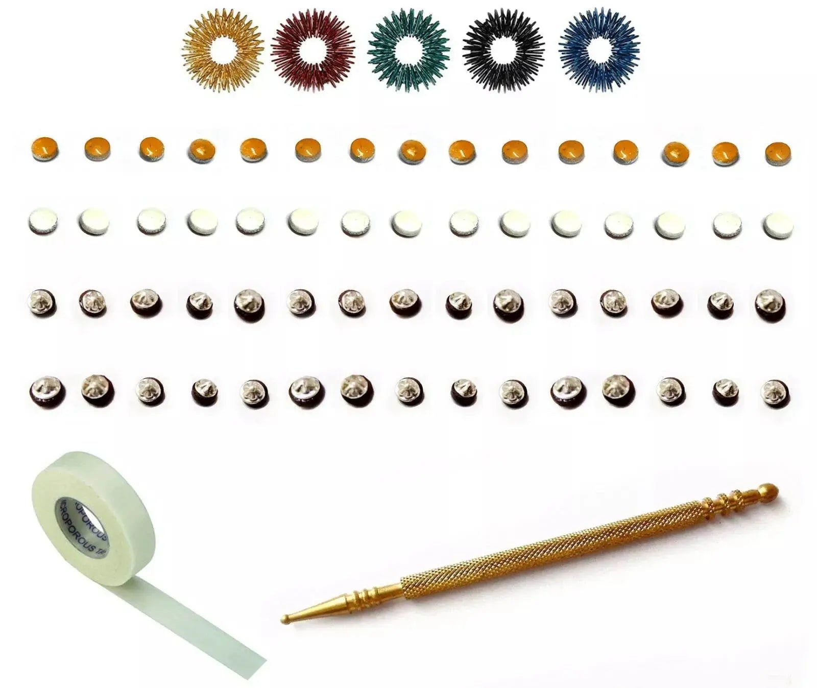 Sujok therapy magnets, acupressure rings, micropore tape, and Slim Jimmy for holistic healing