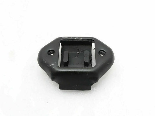 Black rear transmission mounting bushing with bolt holes and metal bracket