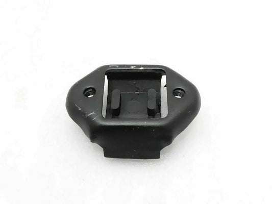 Black rear transmission mounting bushing with bolt holes and metal bracket