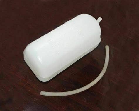 Suzuki Samurai coolant bottle radiator overflow tank with attached hose for easy installation