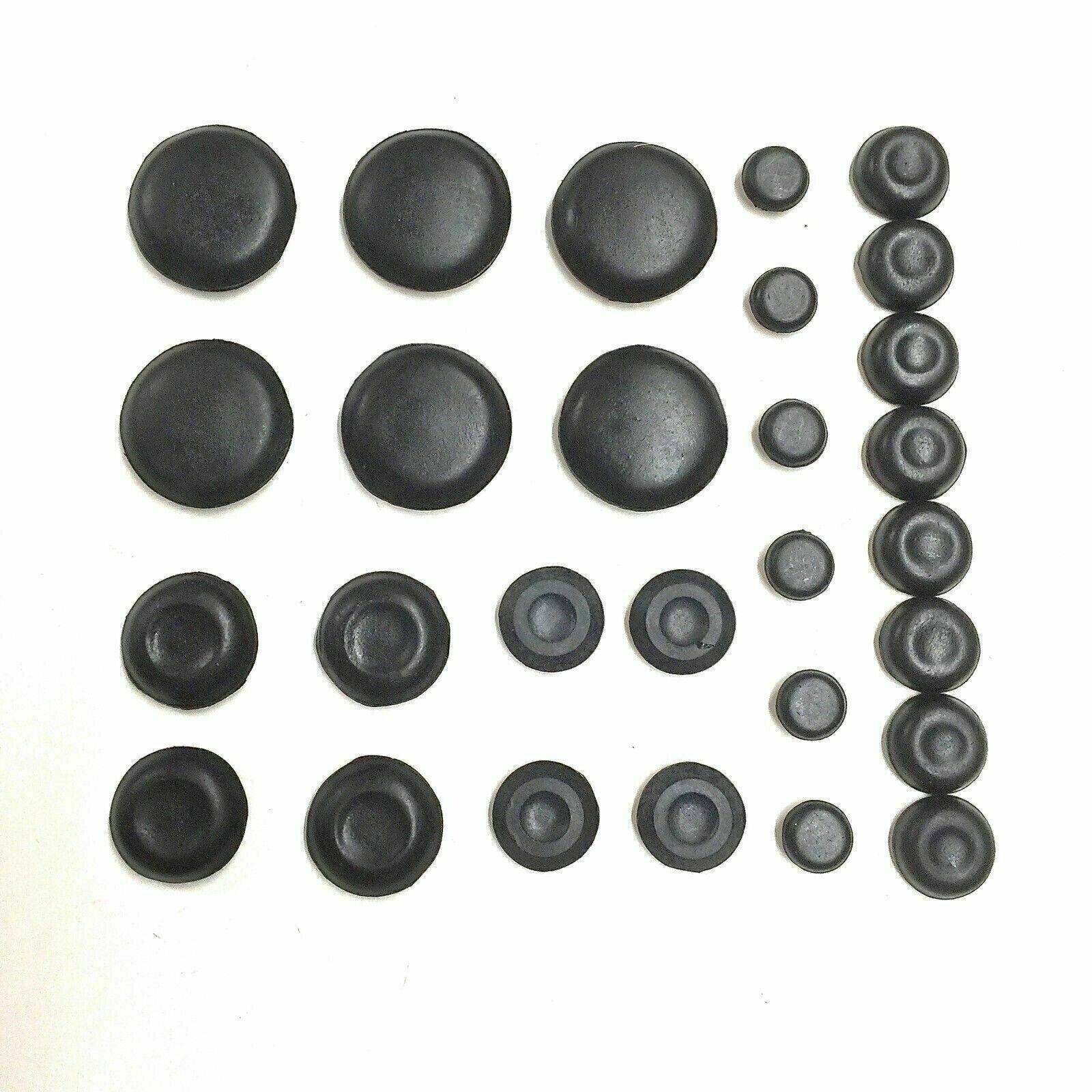 Suzuki Samurai floor pan drain set featuring multiple black rubber plugs for secure sealing