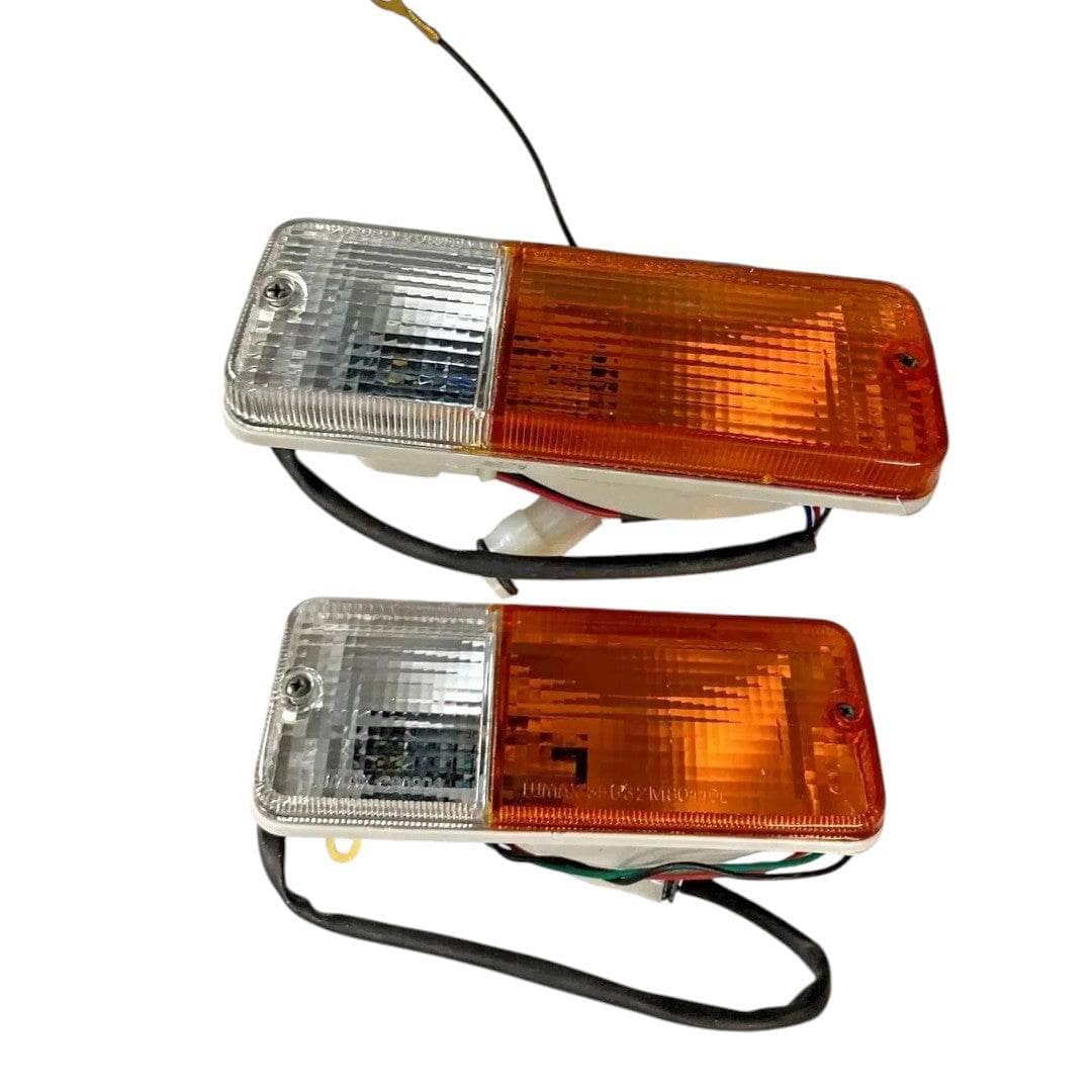 Suzuki Samurai turn signal light set featuring front and rear lights with clear and amber lenses