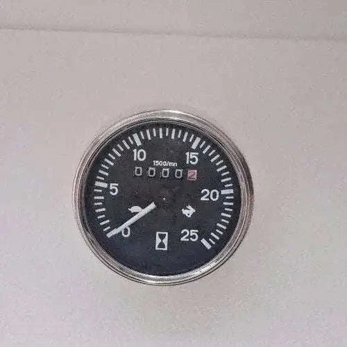 Tractor tachometer gauge with black dial and silver bezel, scale markings