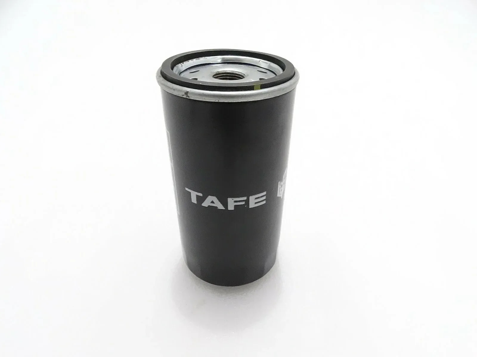 Oil filter for Massey Ferguson model, cylindrical steel design, essential for tractor maintenance