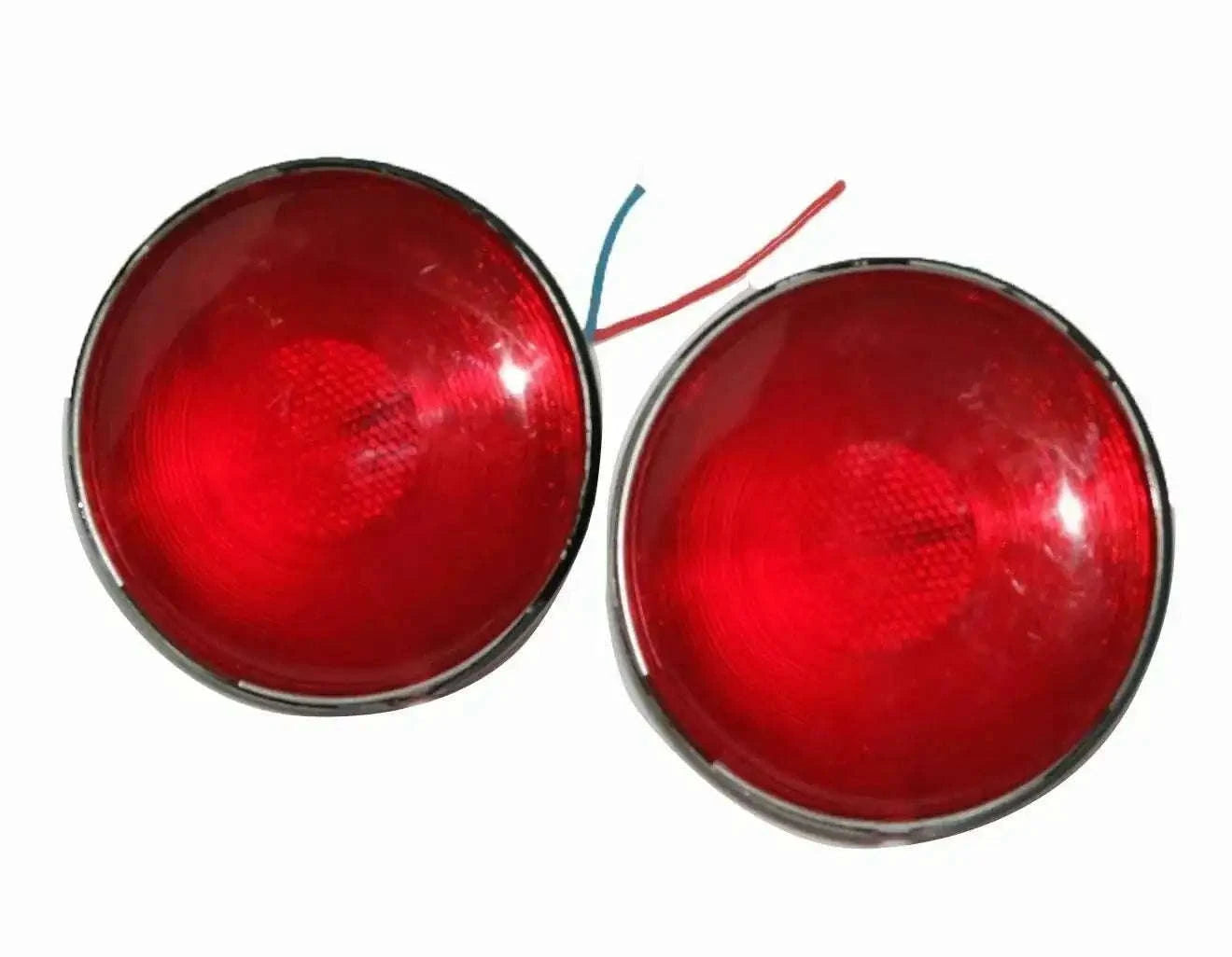 Pair of red tail light lenses with chrome bezels