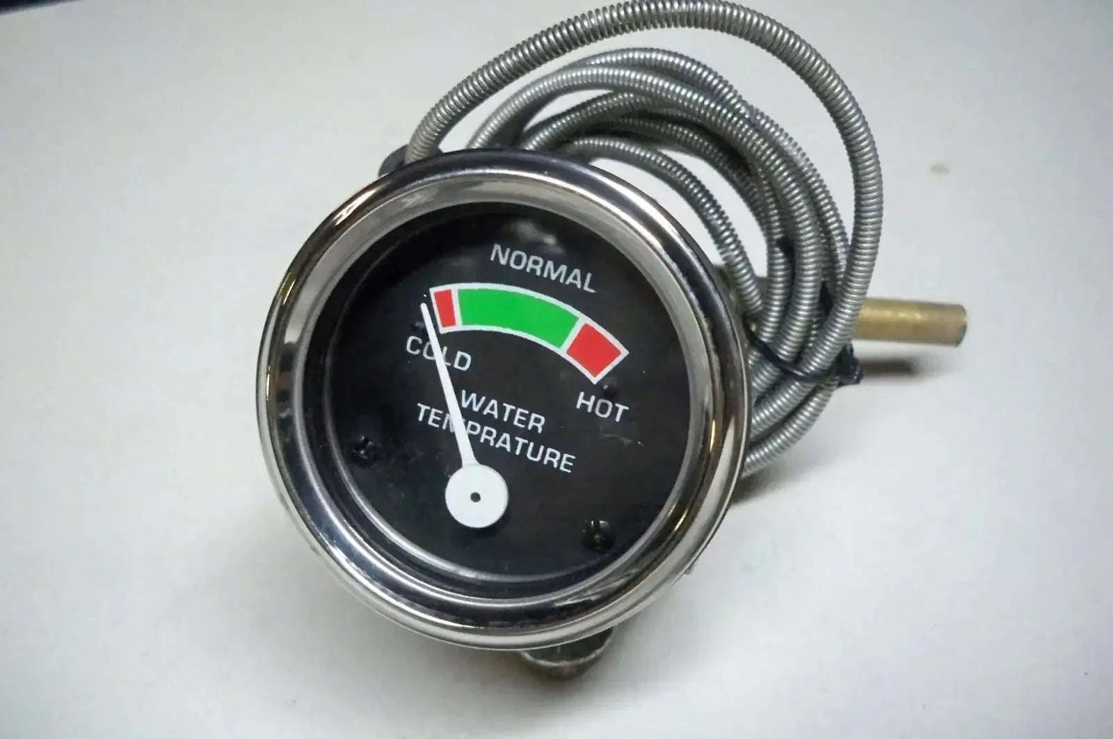 Temperature gauge with chrome bezel, wired sensor and temperature indicator face