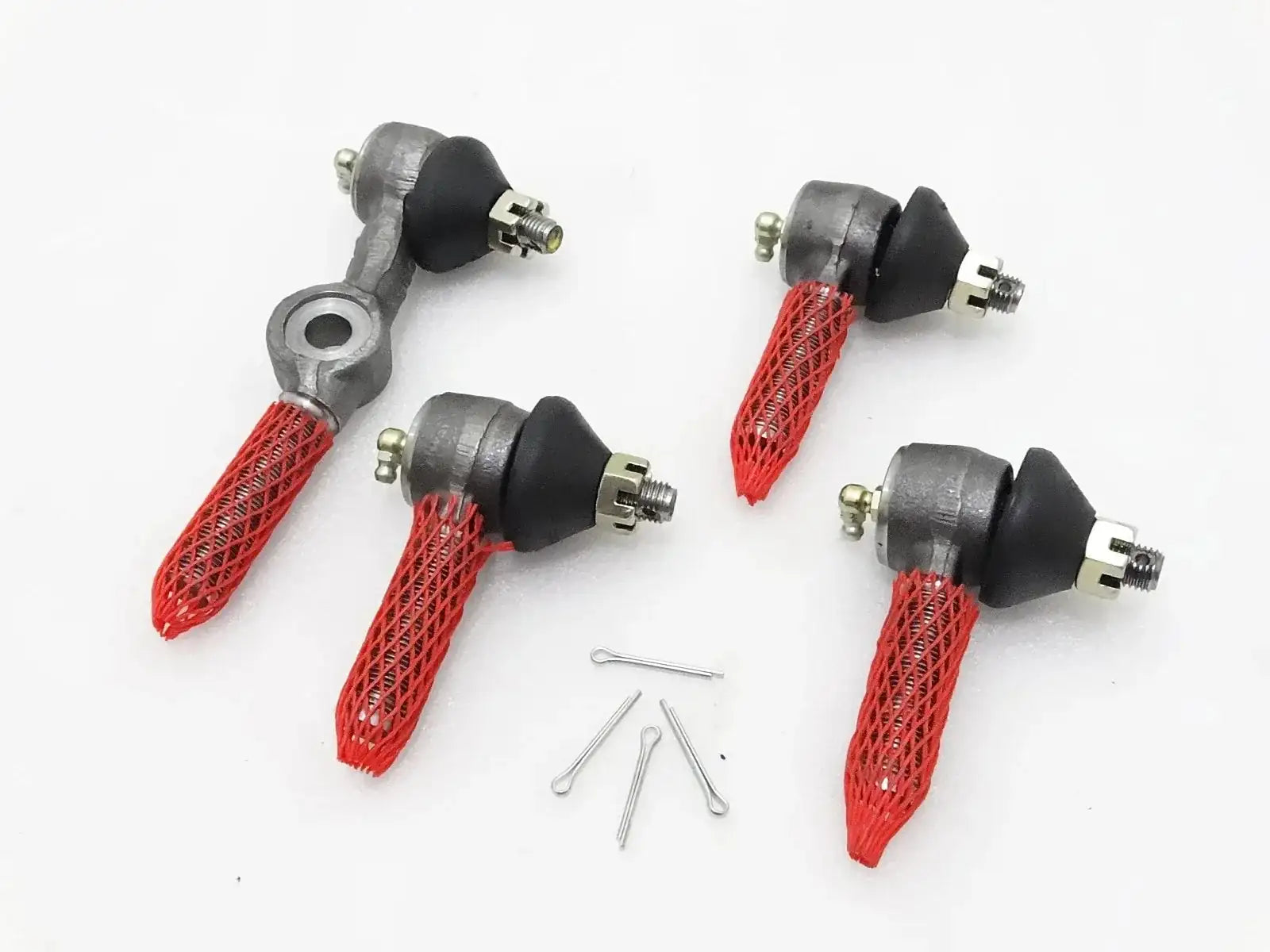 Steering tie rod ends with red mesh boots and retaining hardware, right-hand drive