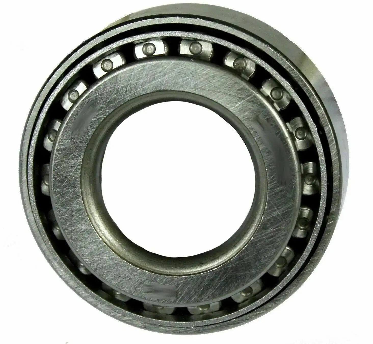 Transmission bearing with metal rings and roller elements