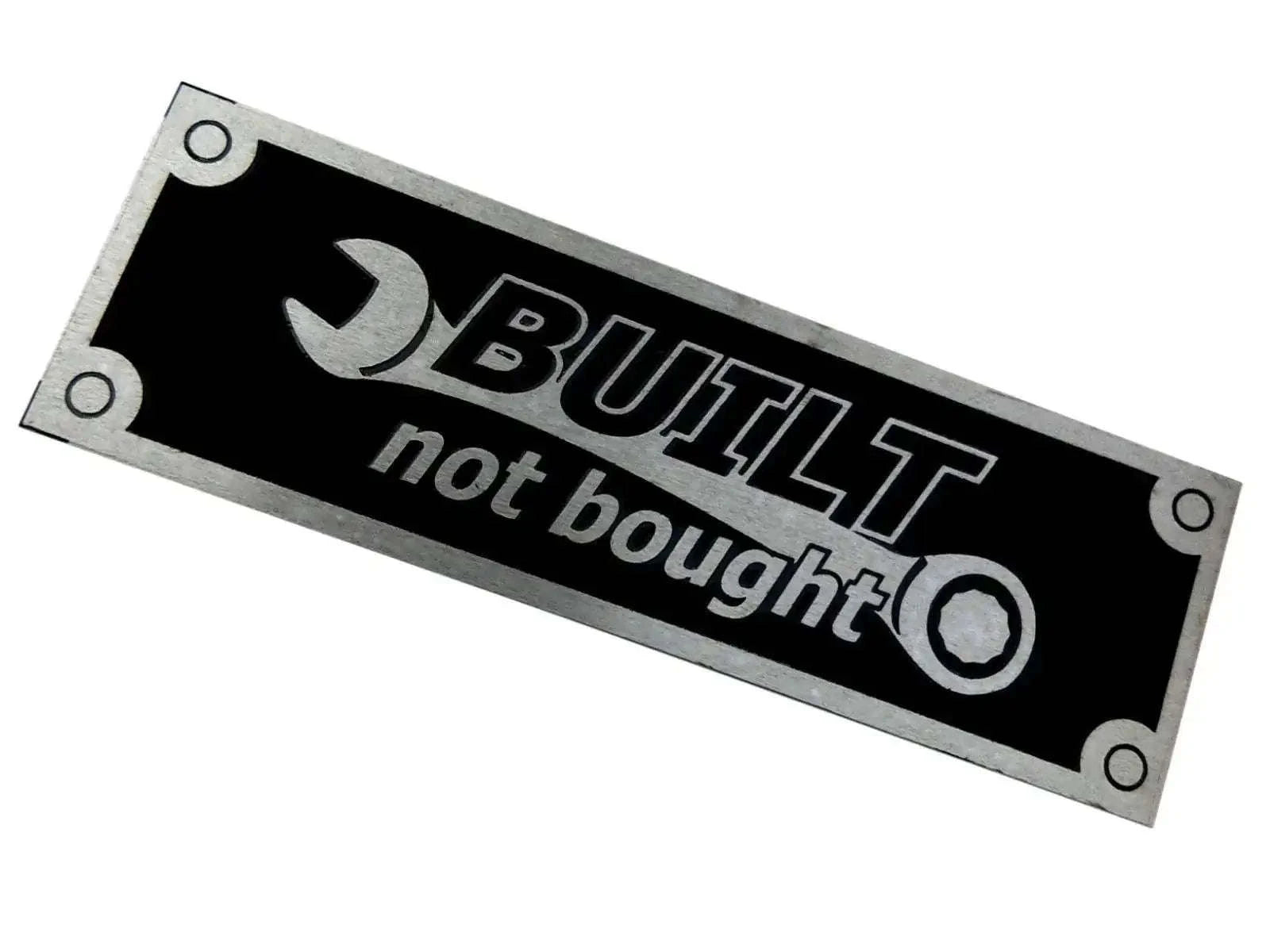 Rectangular aluminum badge plate with Bullit logo and 'not bought' text