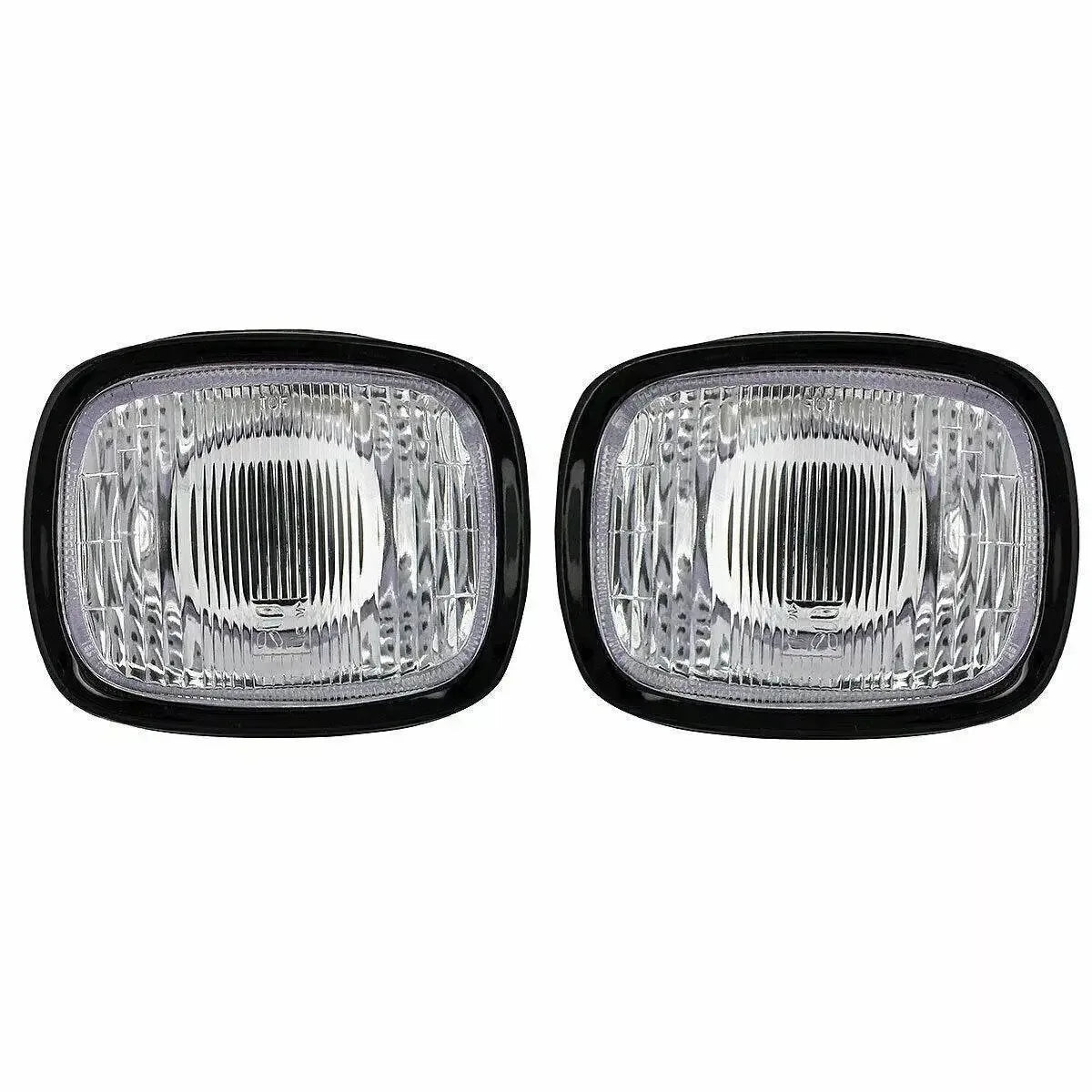 Tractor headlamp set with clear lenses, durable black housing, ideal for enhancing visibility on tractors
