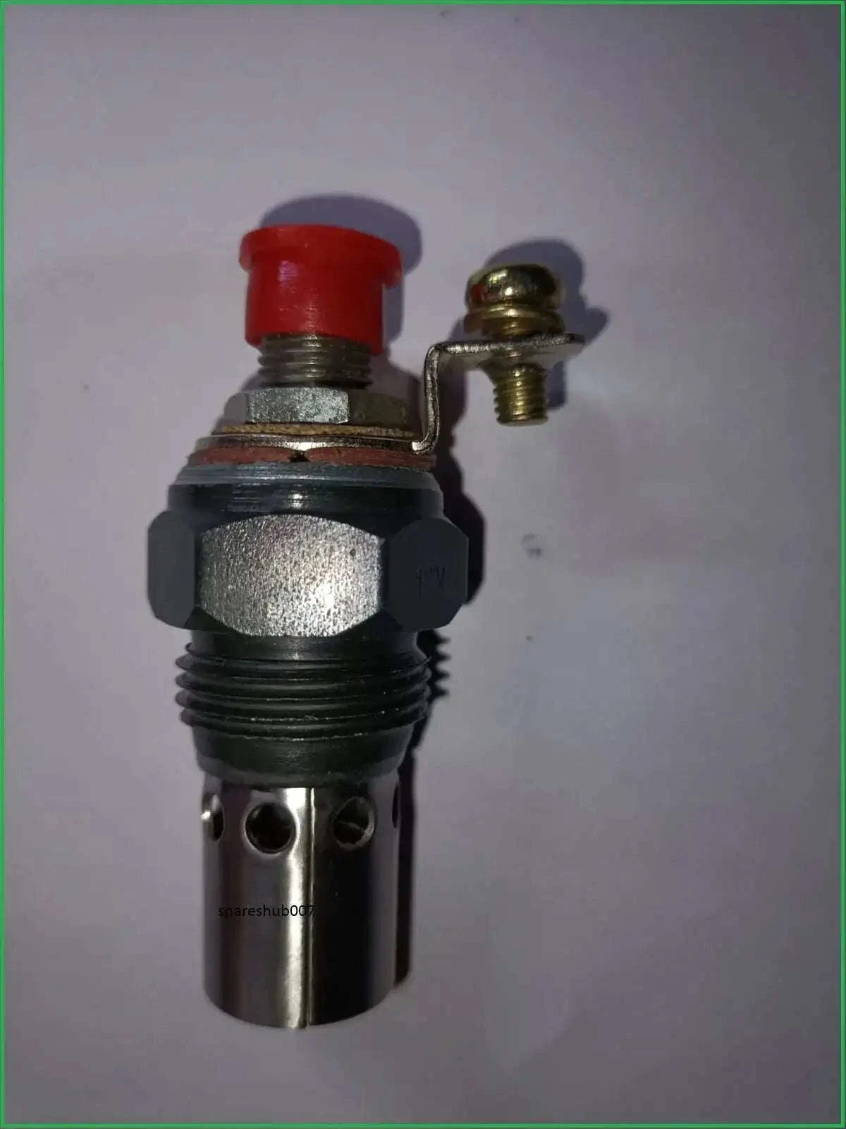 Tractor glow plug, metal construction, compact size, used for efficient engine startup