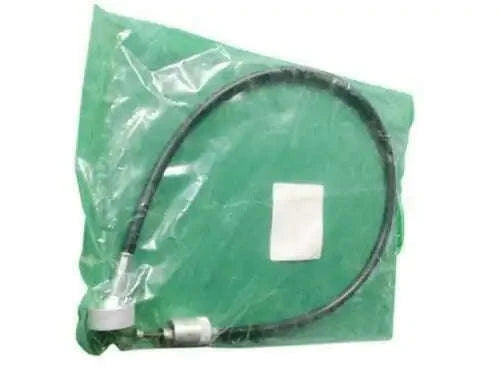 Tractor meter drive cable in plastic bag, coiled black cable and metal fittings.