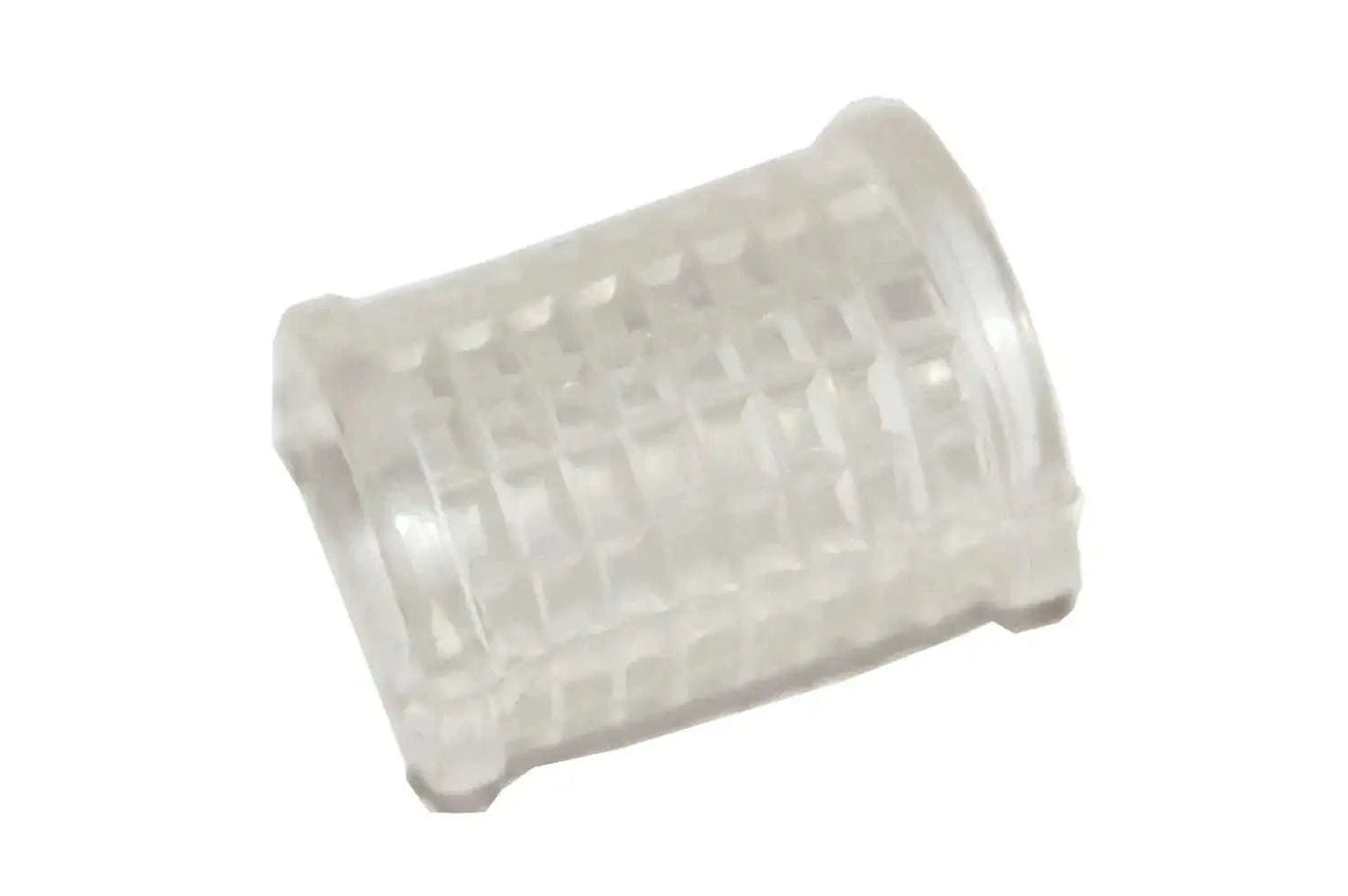 Clear translucent rubber kick starter unit, rectangular sleeve with textured grid pattern