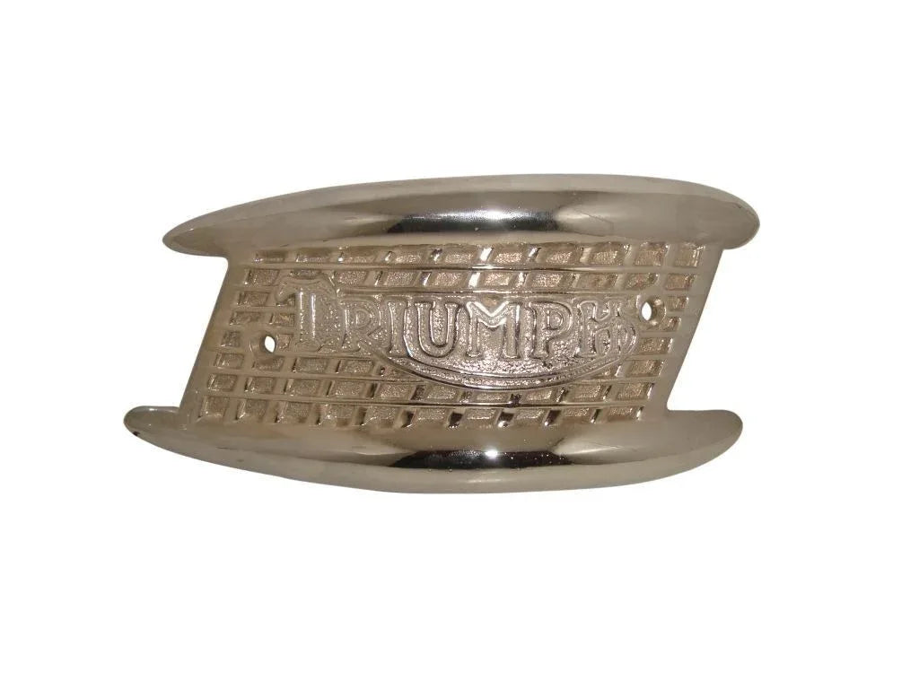 Vintage Triumph tank badge, oval brass with embossed TRIUMPH lettering and metal rim