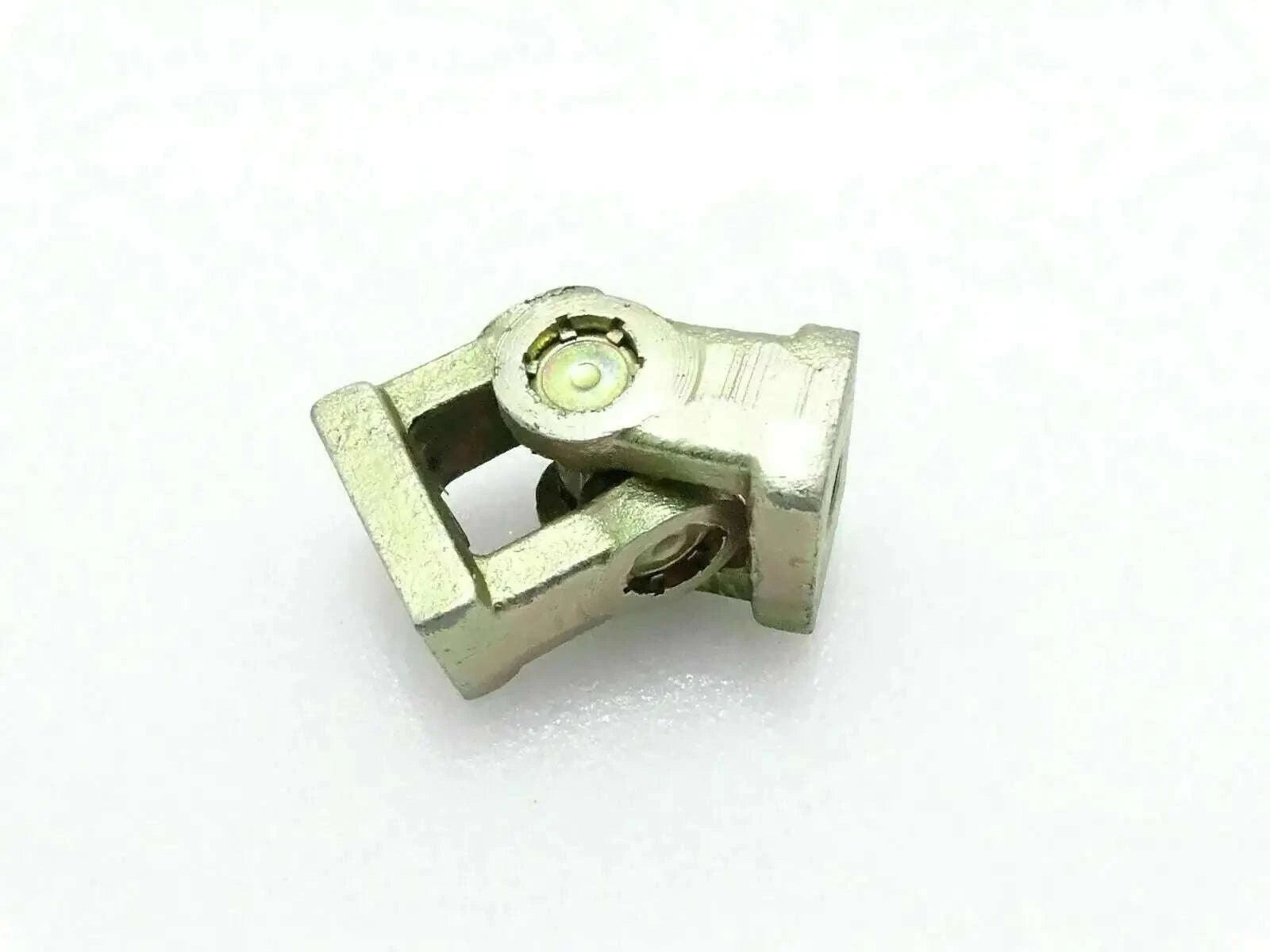 Universal joint yoke connector with greased bearing and mounting bolt
