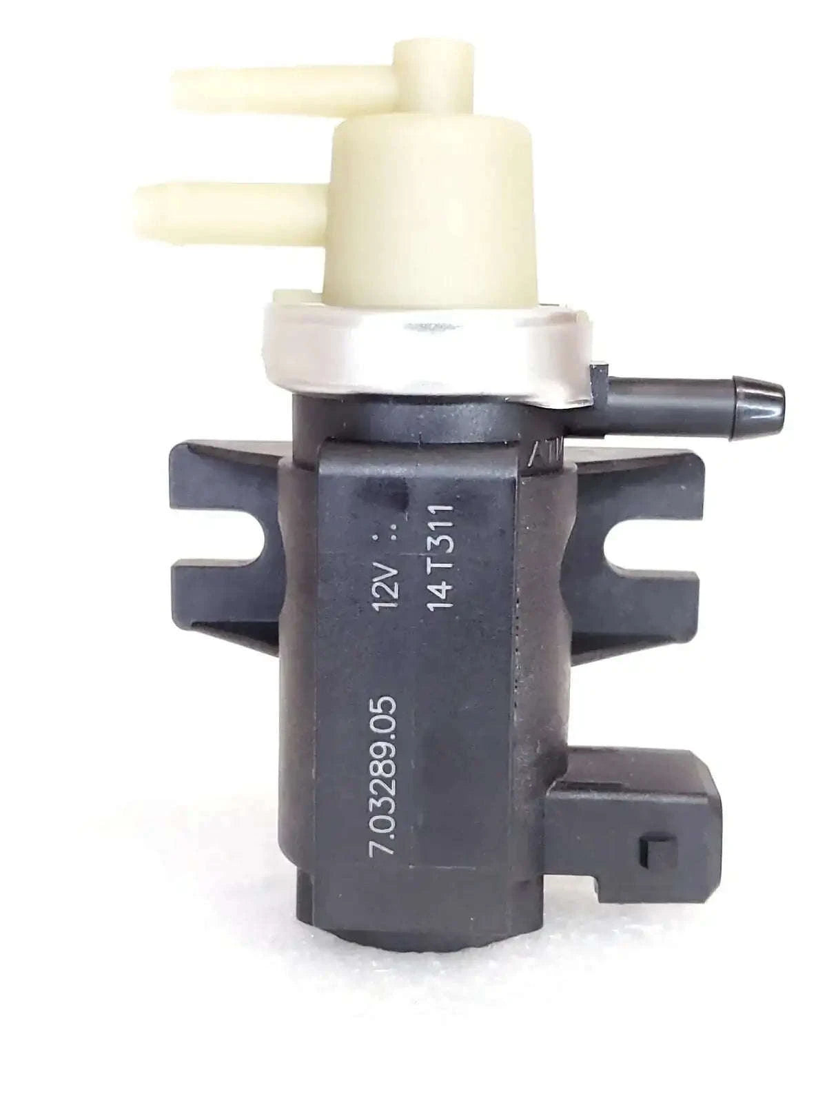 Vacuum modulator valve with white vacuum actuator and gray connector, tractor fit