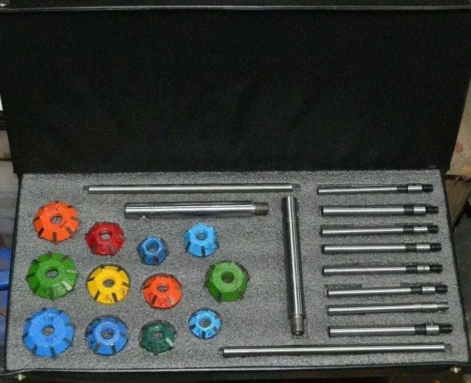 Carbide tipped valve seat cutter set in a protective case, featuring various sizes for precision engine repairs