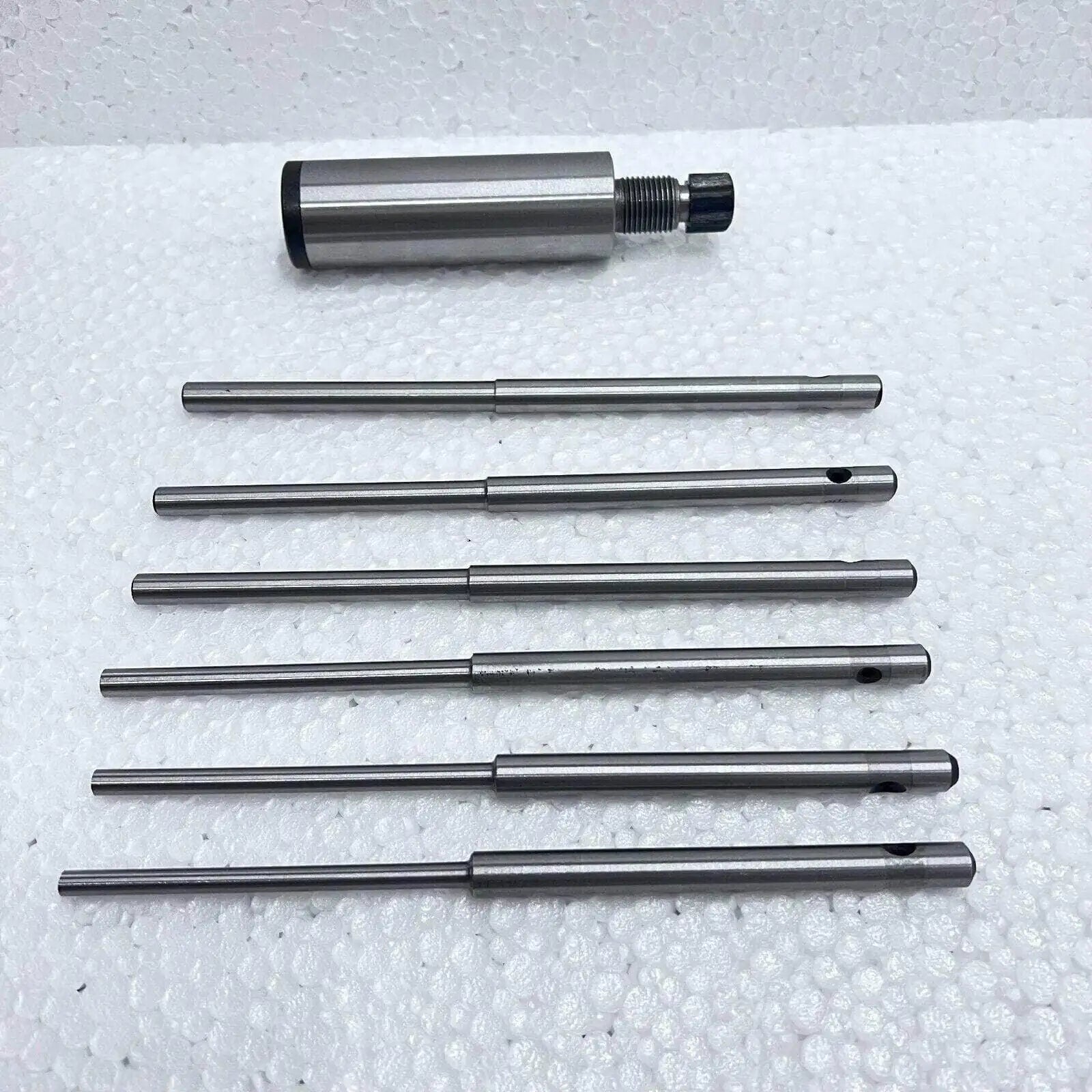 Valve seat grinding stone holder, steel, includes multiple grinding pilots for precision use