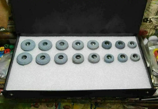 Valve seat grinding stones set in various sizes, made of high-quality material, neatly stored in a case