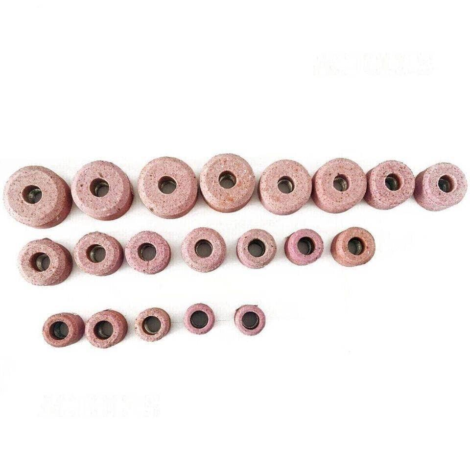 Set of valve seat grinding stones in various sizes, made of durable material for precision engine repairs