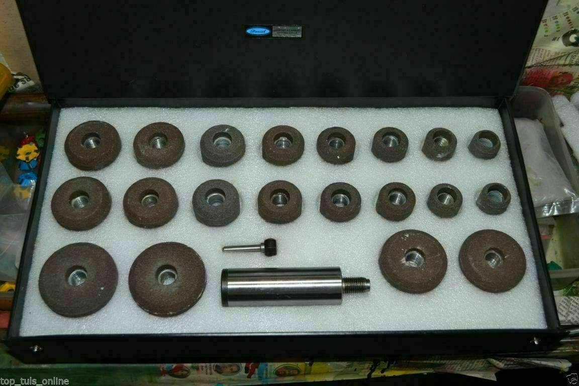 Valve Seat Stones Kit with various grinding stones and a precision handle in a protective case