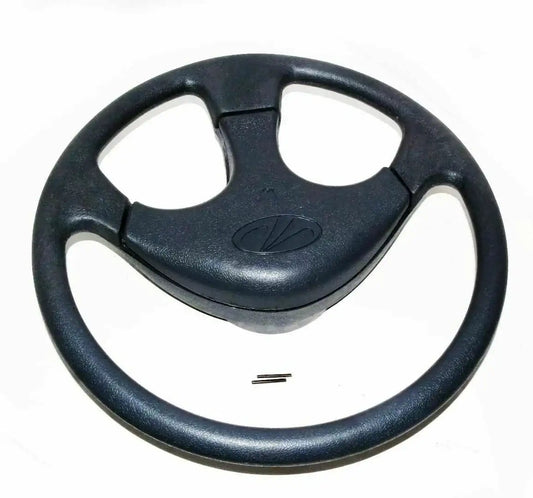 Black steering wheel with textured grips and horn button pad